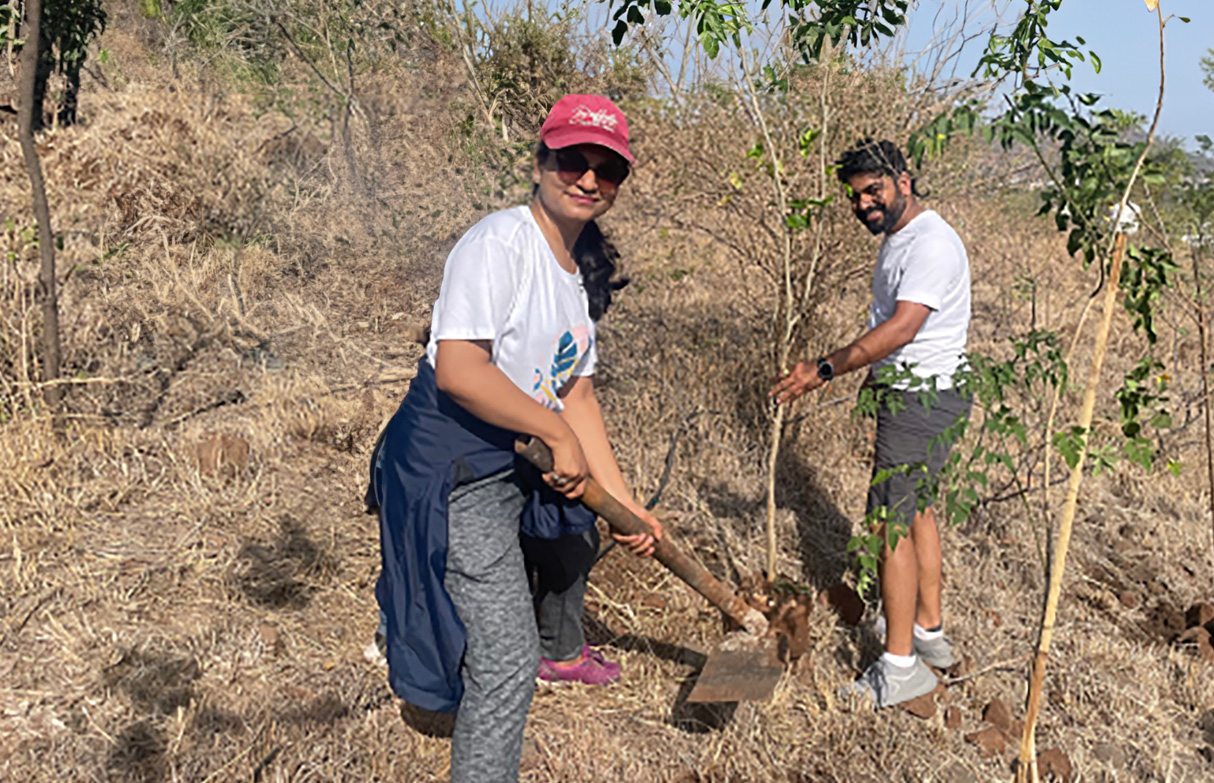Couple planting a tree on their anniversary